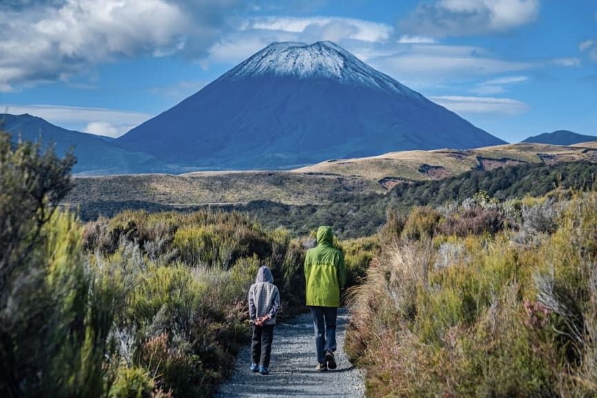 Mother and son hiking in Tongariro National Park, New Zealand