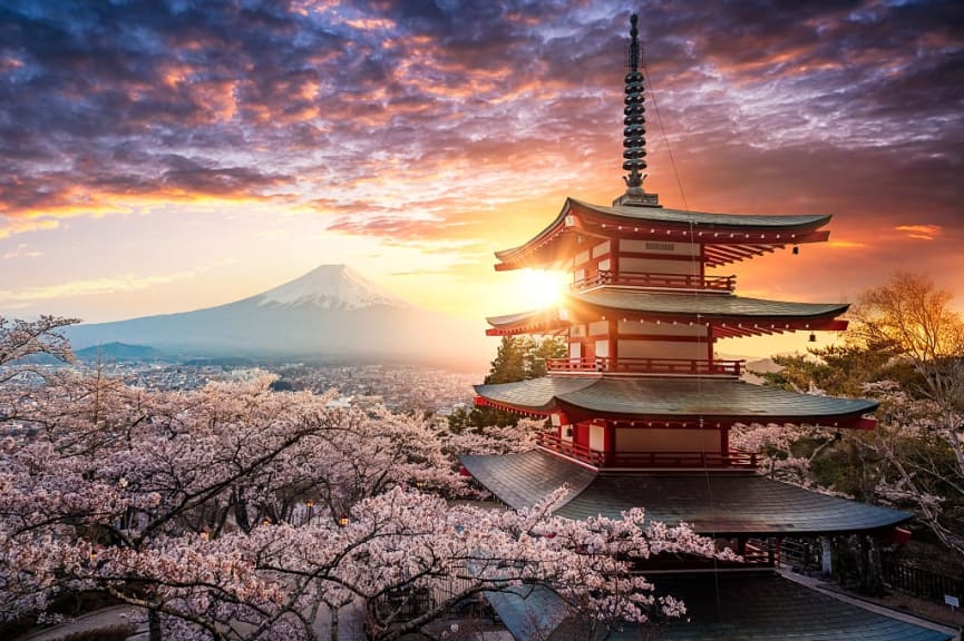 Mount Fuji and Chureito Pagoda with cherry blossoms at sunset, Japan