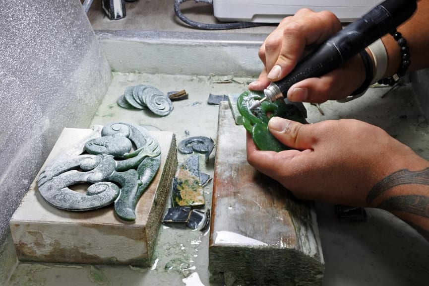 Hands of a Māori jade rock carver in New Zealand