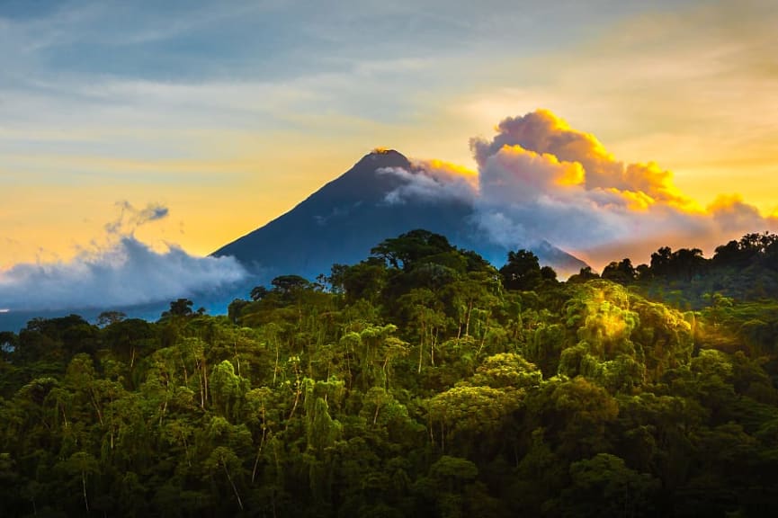 Arenal Volcano surrounded by lush rainforest in La Fortuna, Costa Rica