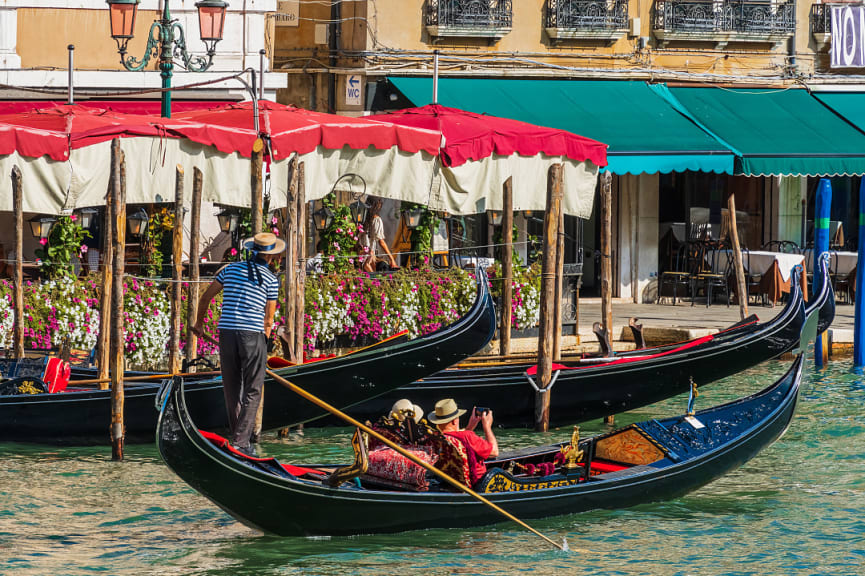 Senior couple on a gondola ride in Venice, Italy