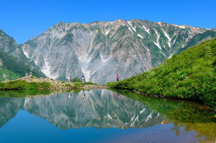 Japanese alps, shirouma mountains and happo-oike pond at happo-one in hakuba, japan