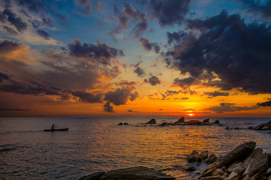 Canoeing Lake Malawi at sunset