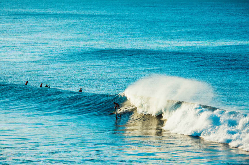 Surfers at Bells Beach in Victoria