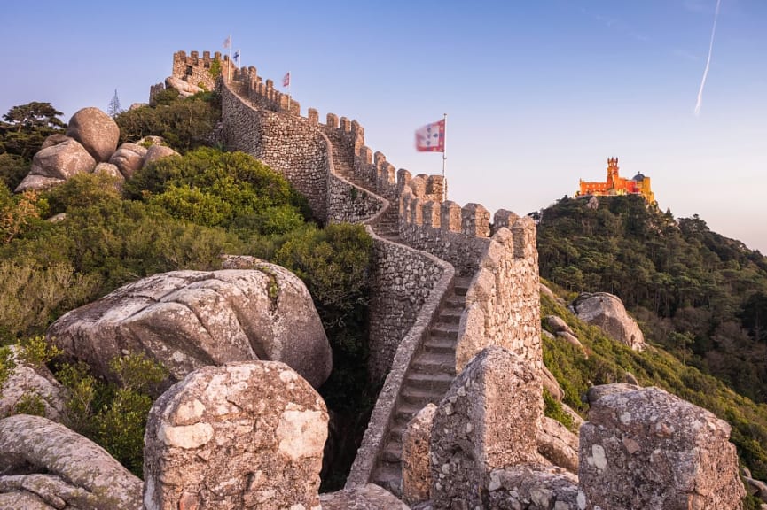 Castle of the Moors, with Pena Palace on the hill on the background, in Sintra