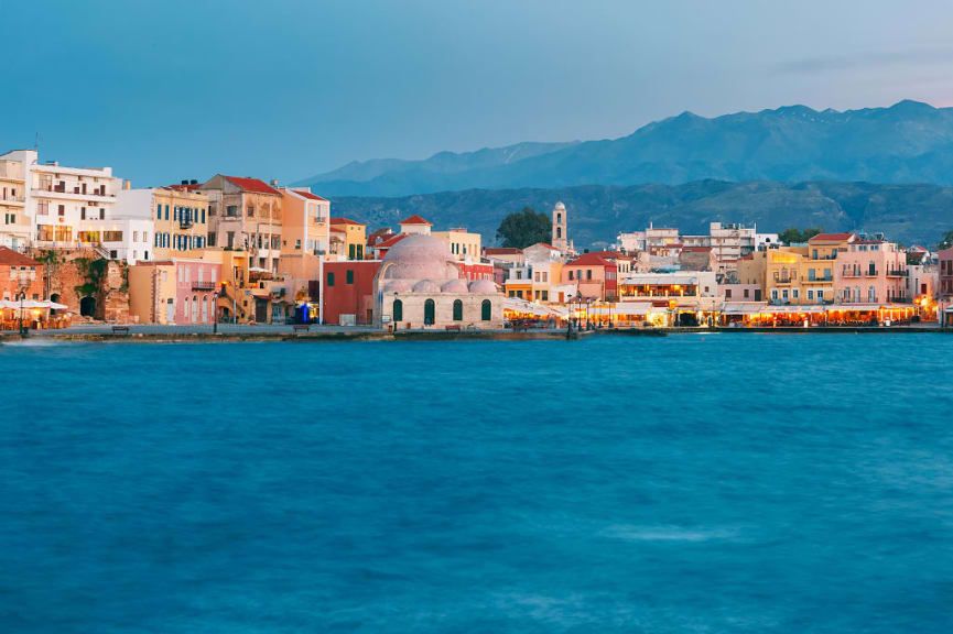 Venetian Quay of Chania with Kucuk Hasan Pasha Mosque during twilight blue hour, Crete, Greece