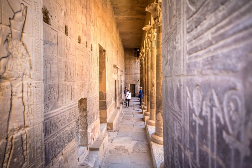 Senior tourists visiting Philae Temple in Aswan, Egypt