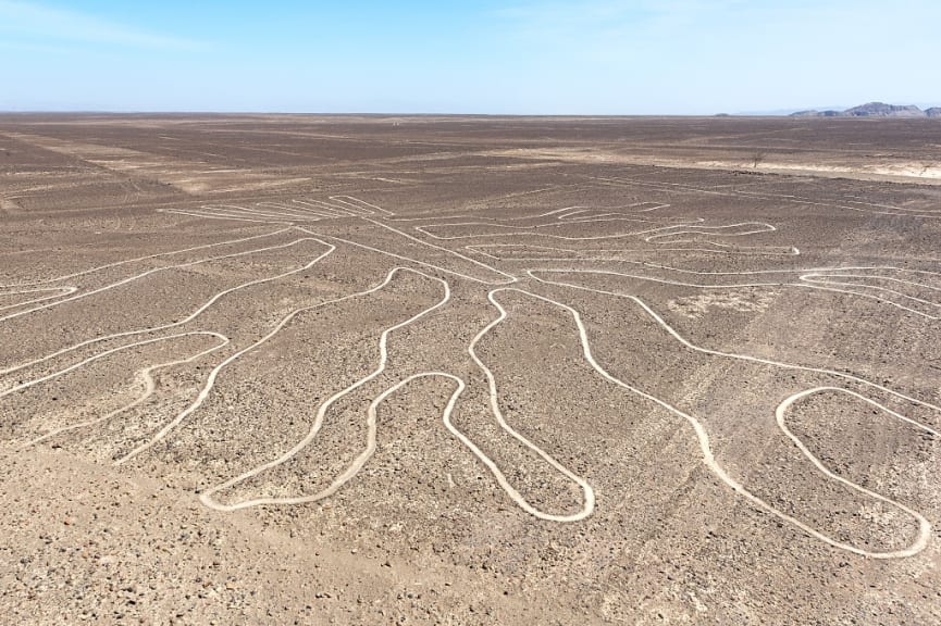 The Nazca Lines, a group of pre-Columbian geoglyphs etched into desert sand in southern Peru