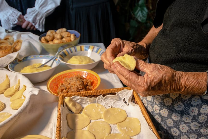 Older woman making culurgiones in Sardinia