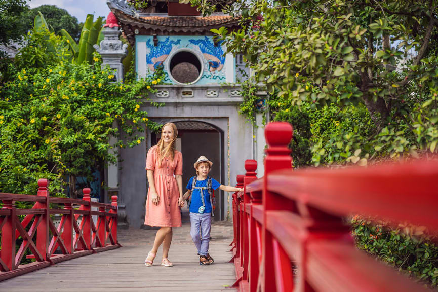 Mother and son on the Hoan Keim Lake Bridge in Hanoi, Vietnam