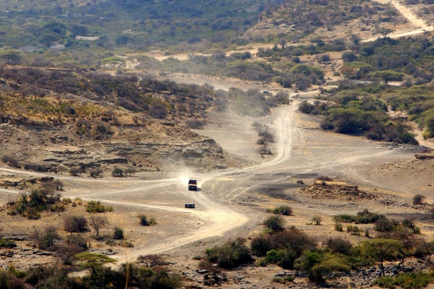 Jeep going through Cradle of Mankind in Olduvai Gorge, Tanzania