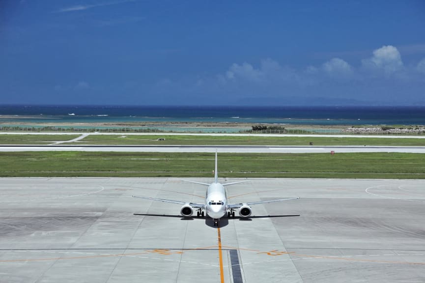 Plane taxiing at Naha Airport on Okinawa, Japan