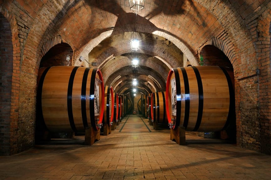 Wine barrels at a winery in Tuscany, Italy