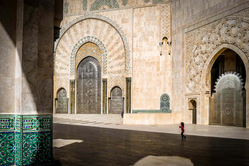 Young girl exploring The Hassan II Mosque is a mosque in Casablanca, Morocco.