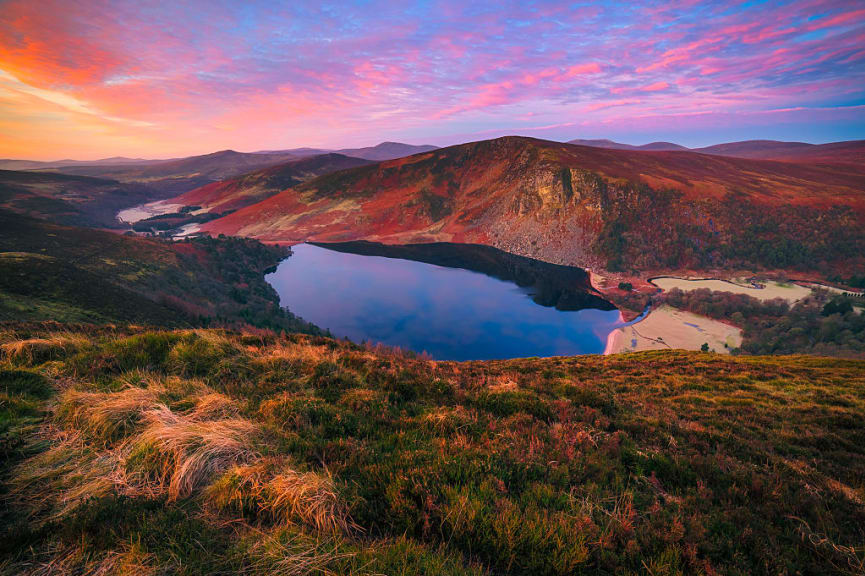 Autumn sunset over Lough Tay in the Wicklow mountains, Ireland