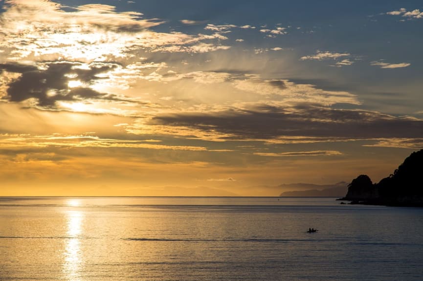 Sunrise kayaking at Abel Tasman National Park, New Zealand