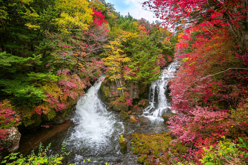 Ryuzu waterfall in the autumn forest of Nikko, Japan