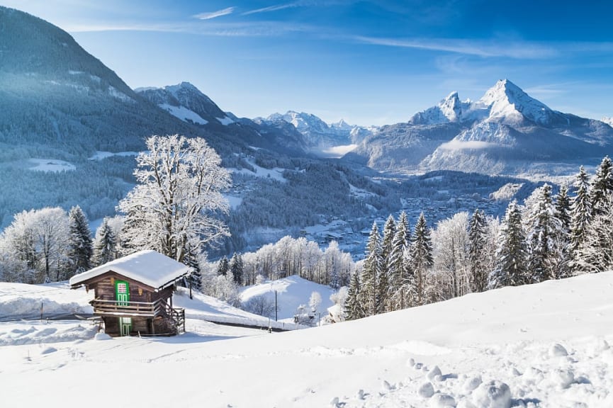 Cozy cabin surrounded by snow in the Bavarian Alps of Germany