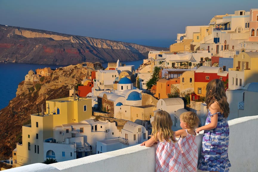 Children at sunset in Santorini, Greece