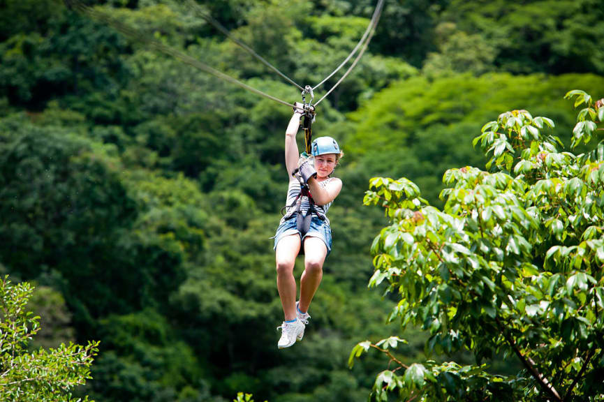 Young traveler ziplining in Costa Rica