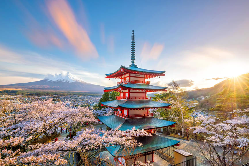 Mount Fuji and Chureito Pagoda with cherry blossoms at sunset, Japan