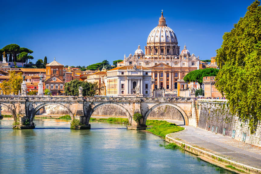 Angelo Bridge over the Tiber River and the Dome of St Peter's Basilica in Rome, Italy