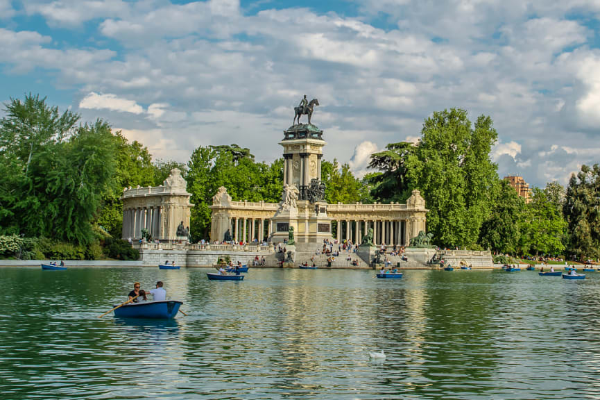 Family boating on the lake at  Retiro Park in Madrid