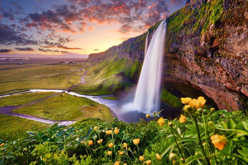 Sunset on seljalandsfoss, one of the most beautiful waterfalls on the iceland