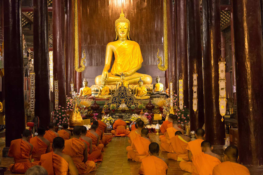 Monks at Wat Chedi Luang in Chiang Mai, Thailand