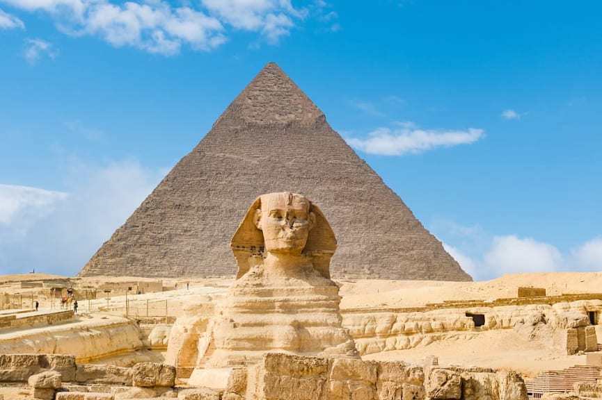 The Great Sphinx of Giza framed by one of the Great Pyramids