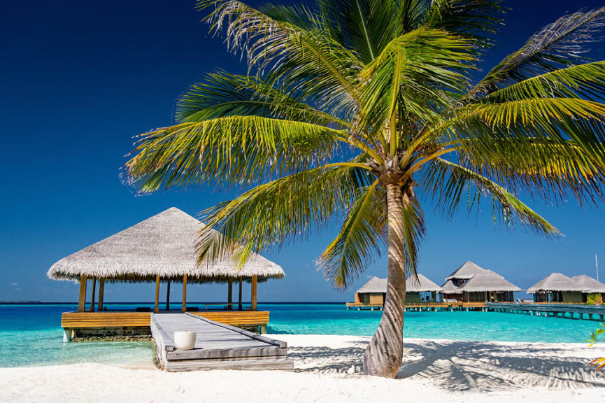 Huts on the beach in Malé Atoll, Maldives