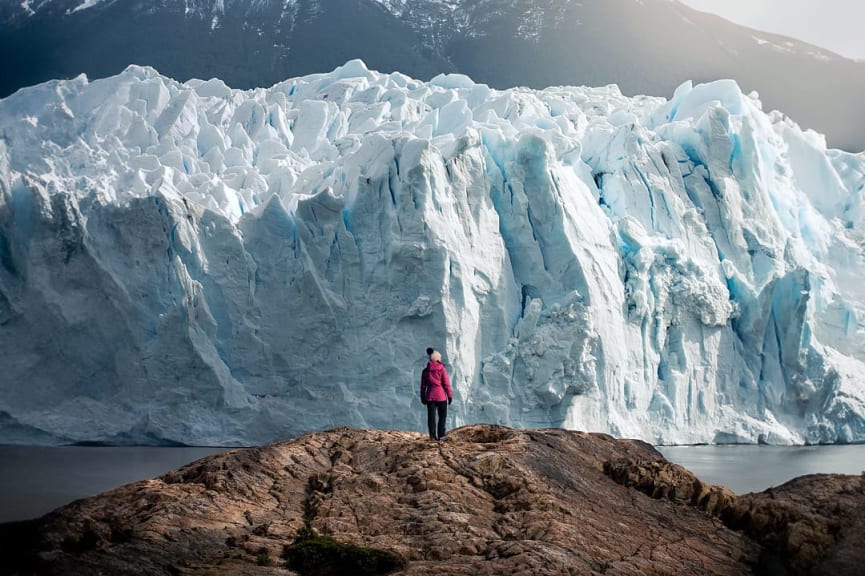 Female traveler at Perito Moreno Glacier in Argentine Patagonia