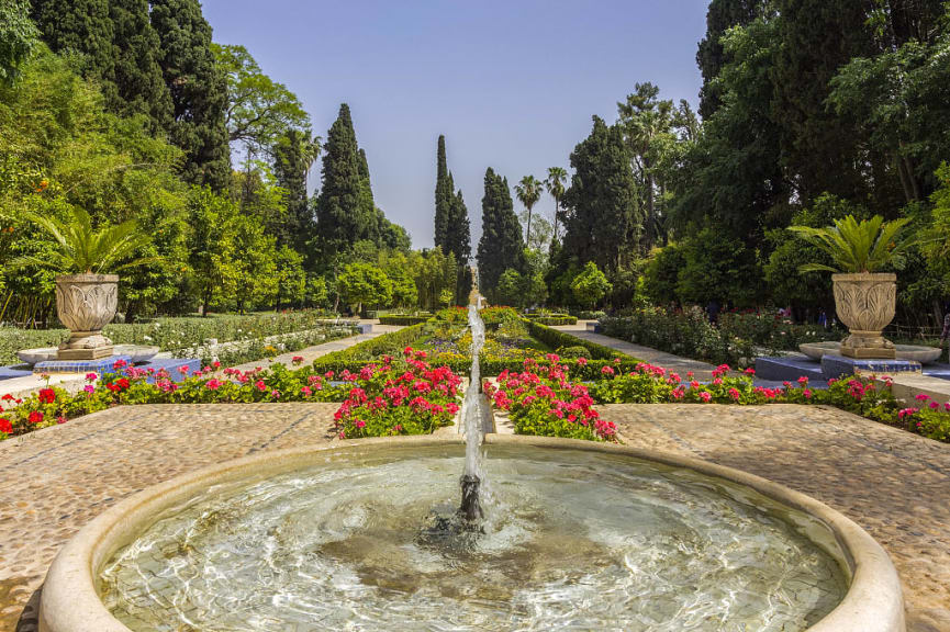 Fountain and flowers in Jnan Sbil Garden, ancient city royal park in Fez