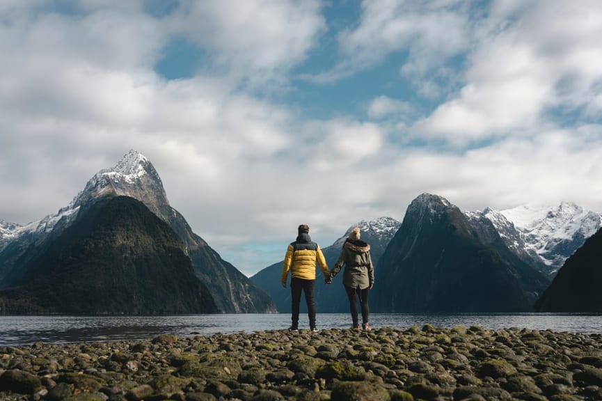 Couple at Milford Sound in New Zealand