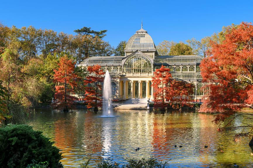 Autumn foliage at Crystal Palace of El Retiro Park, Madrid, Spain