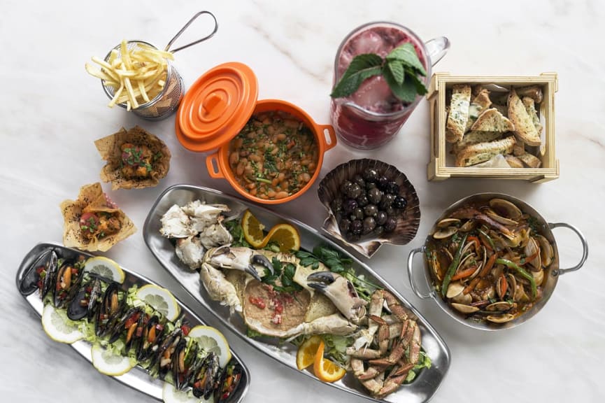 Mixed fresh Portuguese seafood selection at restaurant in Portugal