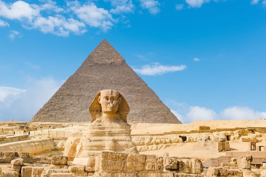 The Great Sphinx of Giza framed by the Great Pyramid in the background