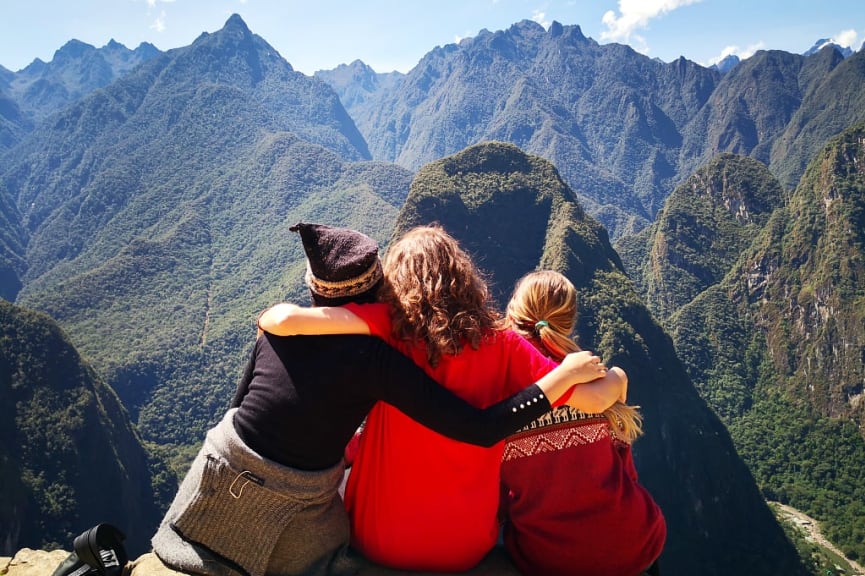 Mom and daughters enjoying the view at Machu Picchu, Peru