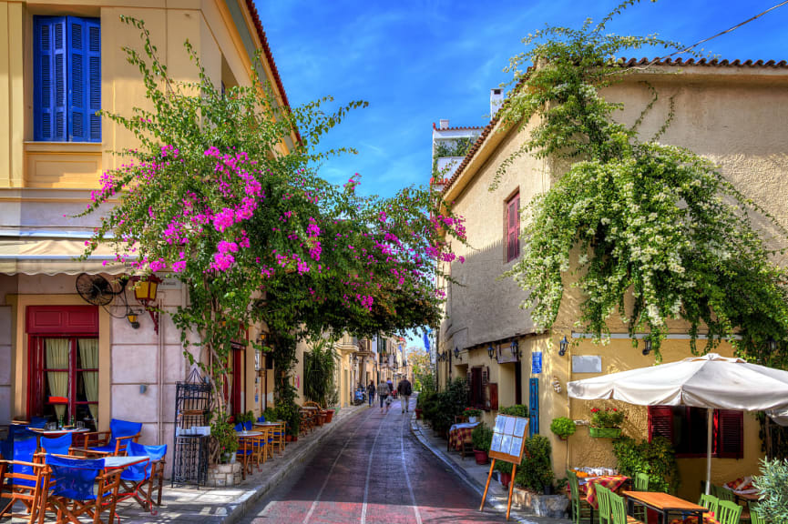 Walkway lined with restaurants and shops in the Plaka neighborhood of Athens, Greece