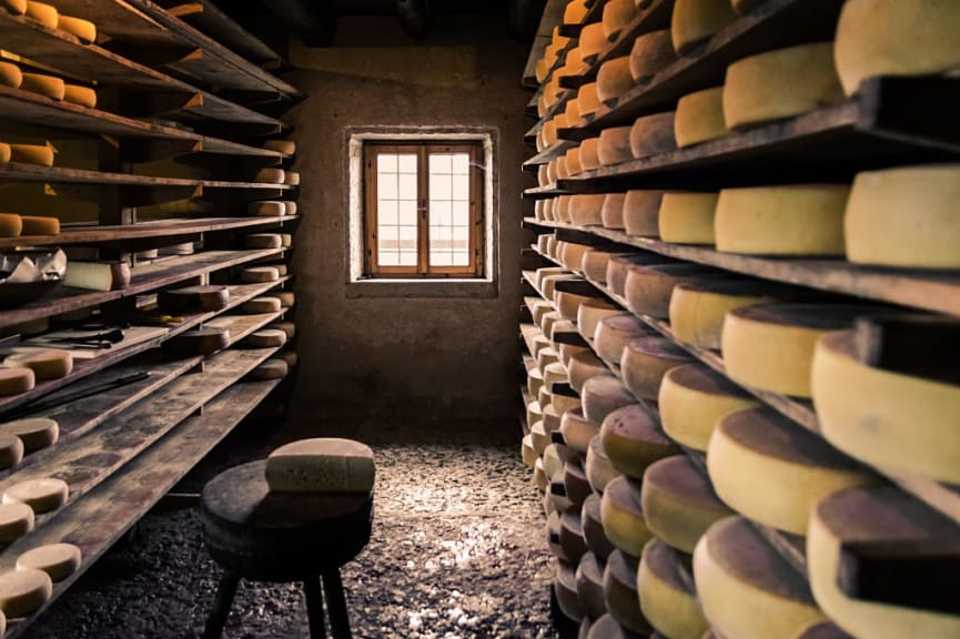 Cheese aging in small farm alpine hut in Val d'Aosta