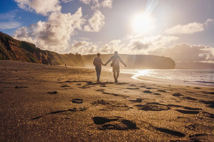 Couple walking on the beach in the Azores