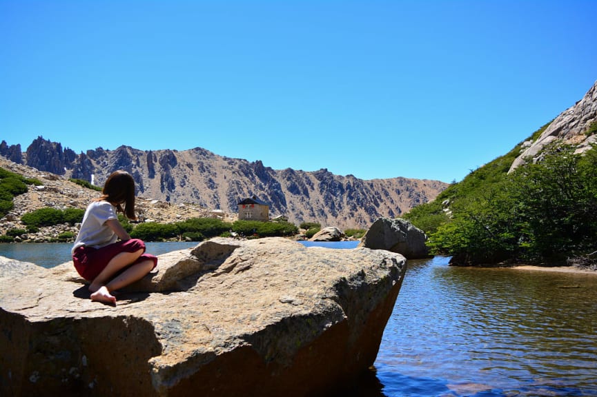 Girl looking at Refugio Frey in Bariloche, Argentina