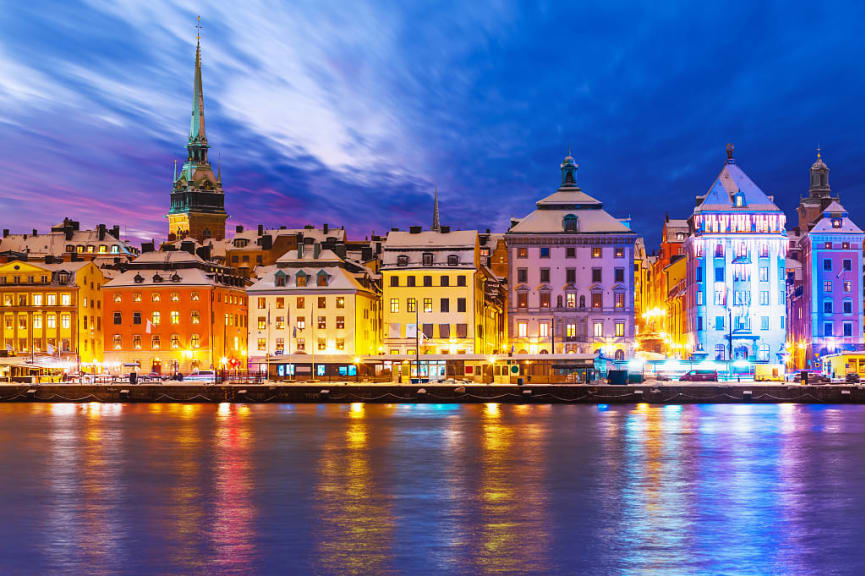 Beautiful winter night panorama of the old town pier in Stockholm, Sweden