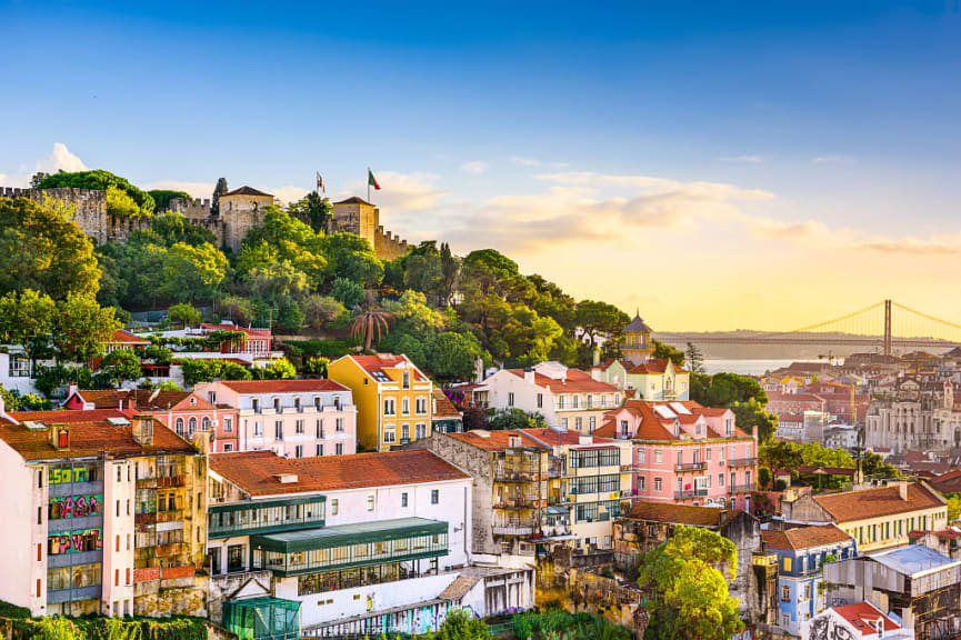 Hilltop Castelo de São Jorge with pastel houses below in Lisbon, Portugal