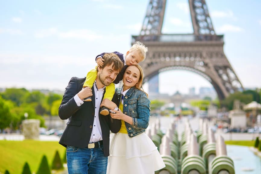 Family at the Eiffel Tower in Paris, France