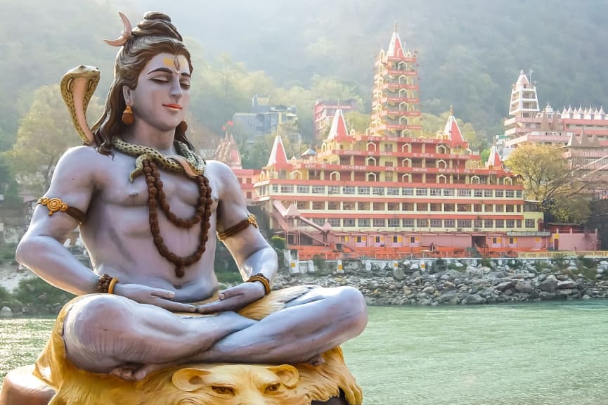 Shiva statue on the riverbank of Ganga in Rishikesh, India