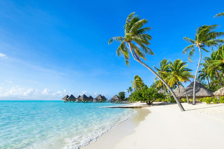 Beautiful beach and overwater bungalows in Tahiti