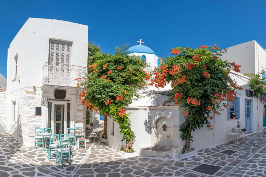 Cozy street with cafe in Parikia on Paros Island, Greece