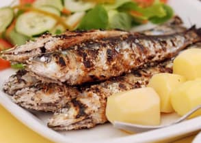 Grilled sardine served at a restaurant in Lisbon, Portugal