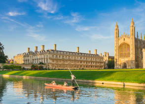 Couple punting on Cam River in Cambridge, England